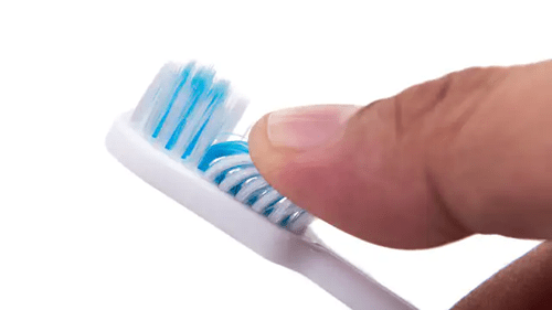 Oral Hygiene Facts - hard bristle toothbrush