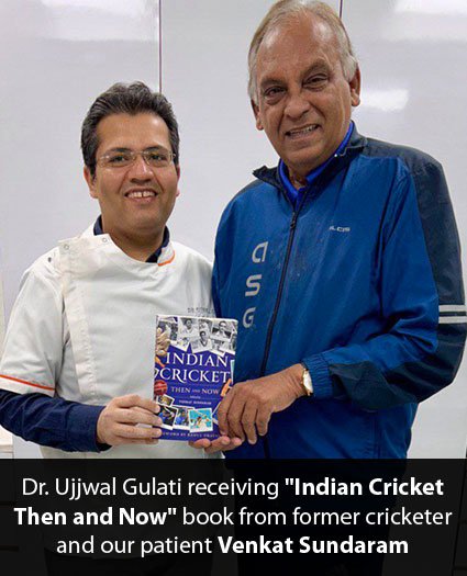 Dr. Ujjwal Gulati receiving “Indian Cricket Then and Now” book from former cricketer and our patient Venkat Sundaram